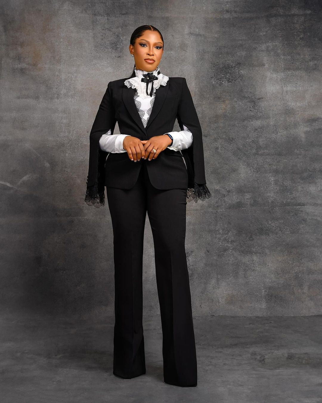 Classic two-piece lace blazer and pant set, tailored for the mother of the bride or wedding guest.